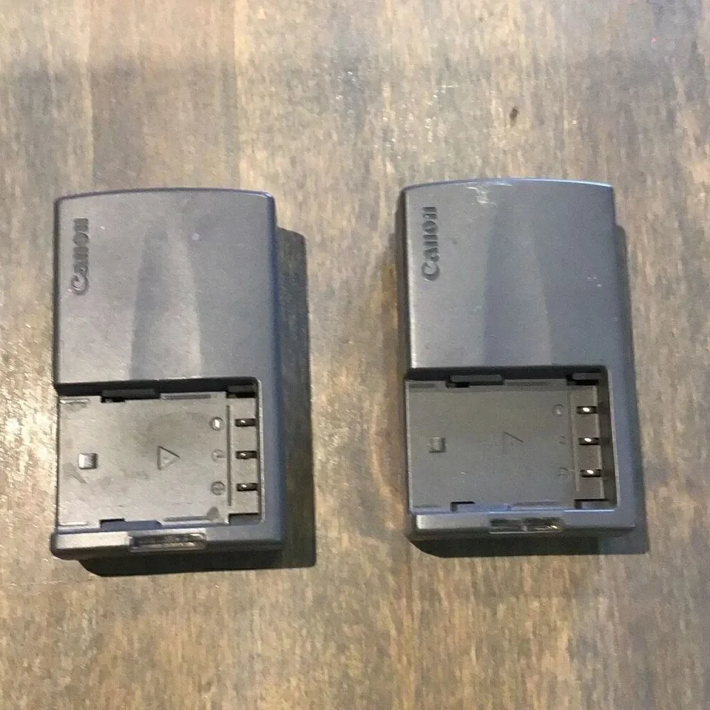 Pair of Cannon CB-2LT camera battery chargers